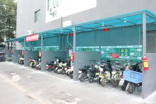 民治街道推进电动自行车停放充电点规范化建设管理试点工作