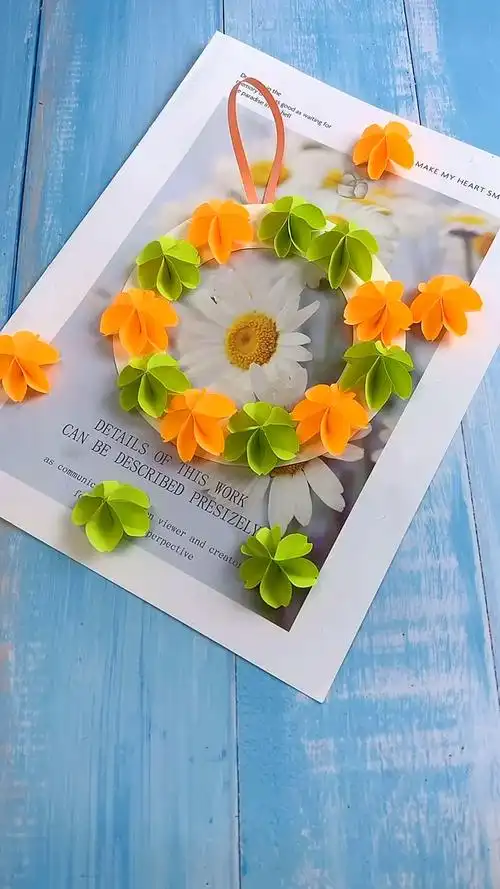 手工制作#折纸花环,和孩子一起做,挂在墙上简直太美了!-度小视