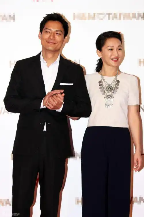 新闻中心 娱乐无极限 娱乐休闲 正文   周迅与老公高圣远为国际时尚