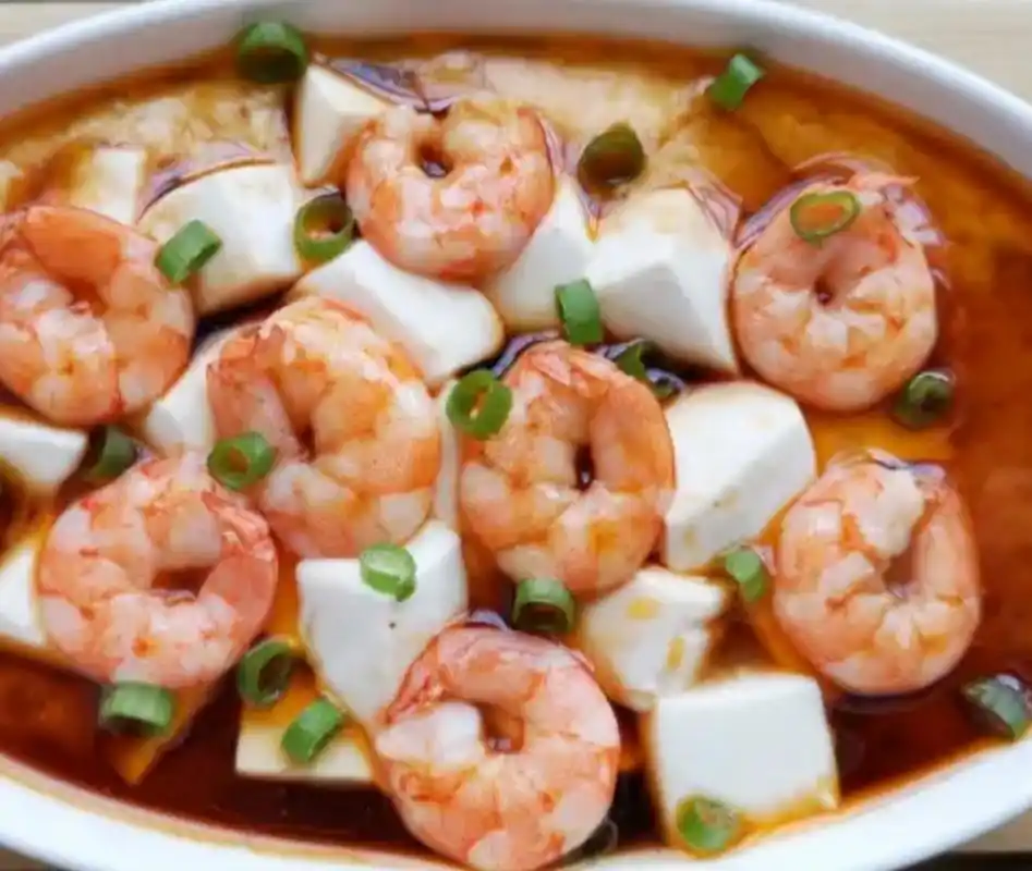 我的美食分享#  虾仁豆腐蒸蛋  做法:  1:嫩豆腐冲洗一下,切成锌殚