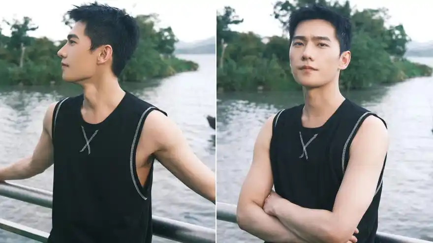 杨洋穿黑色无袖背心秀手臂肌肉 侧颜线条流畅帅气有型