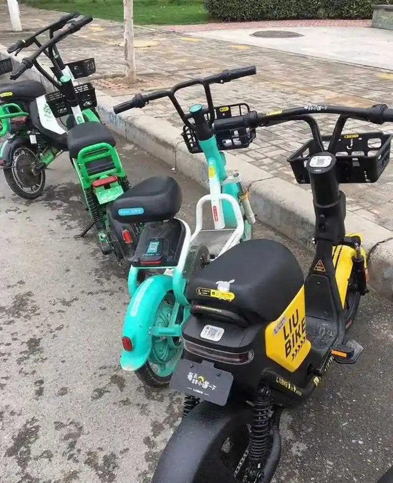 郑州非中心城区的新郑等地街头,出现了很多共享电动车,品牌也很多元