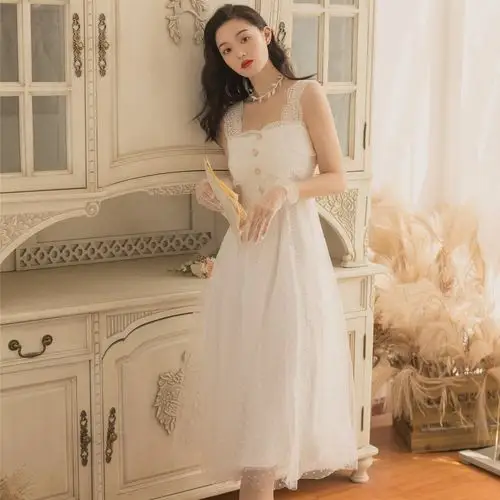 裙子超仙女超仙森系法式复古裙过膝白色吊带蕾丝连衣裙2022新款夏