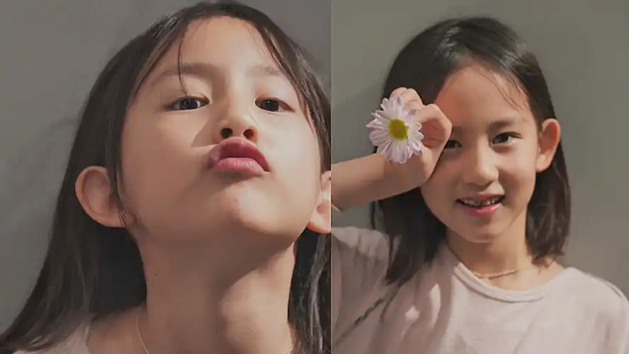 黄少艾今年9岁,善于拍照,眼神很会演戏,样子很像平