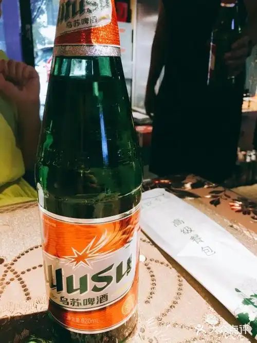 新疆儿子娃娃餐厅乌苏啤酒图片