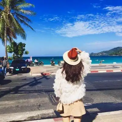 微信头像海边女孩坐着背景