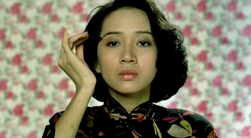 梅艳芳gif画眉毛gif旗袍gif眉笔gif