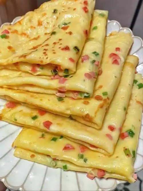 这样做出来的鸡蛋饼,又薄又软,好吃又营养,家里小孩子吵着要吃