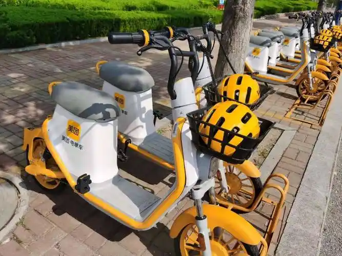 快讯烟台首创美团共享单车配上头盔