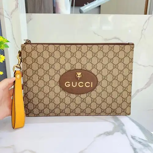 古驰/gucci经典款印花金属虎头男士手拿包   尺寸约:31*21    现货