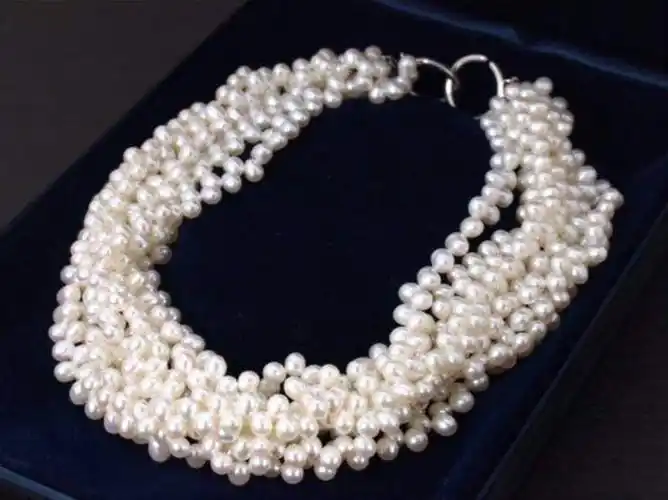 co/蒂芙尼 天然珍珠项链,出席宴会,晚会均可,链长42cm,重约198.2g.