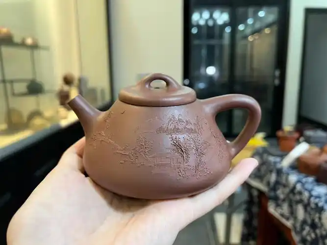 本色堆绘子冶石瓢紫砂壶