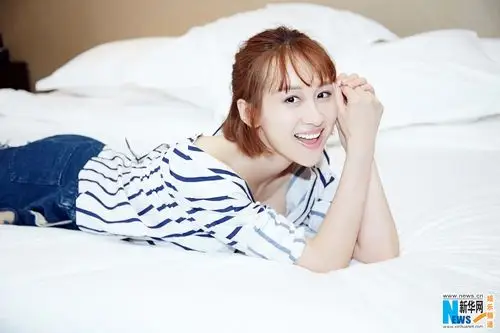 练束梅曝最新写真笑容甜美气质优雅