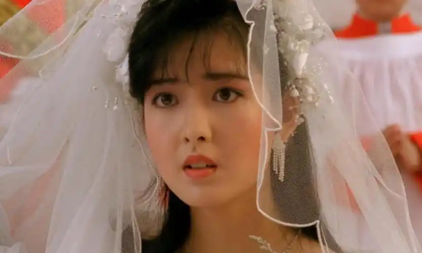 周慧敏是90年代我们心目中的"清纯玉女".