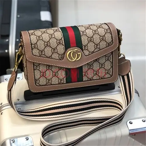 酷奇女包轻奢品牌女包香港真皮小包包女2021新款小方包百搭单肩包女网