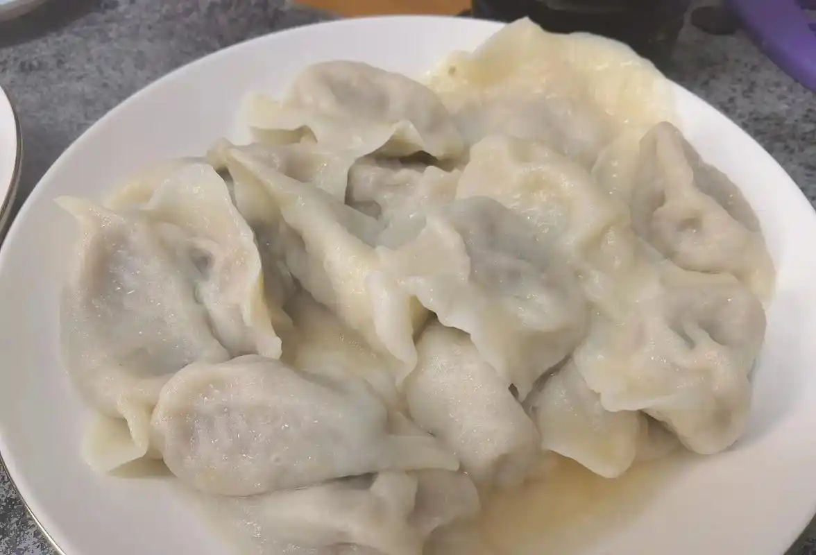 给孩子们包饺子图片想起了小时候妈妈给我们包饺子的场景怀念幸福希望