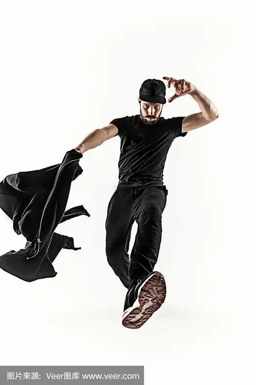 一个嘻哈男霹雳舞舞者的剪影在白色的背景上跳舞