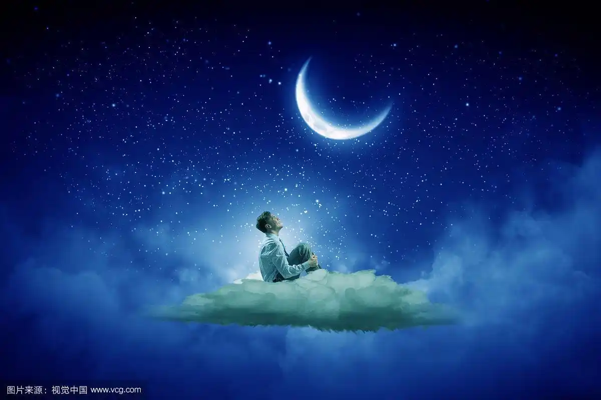 夜空中的商人.西装革履的商人独自坐在云上望着月亮