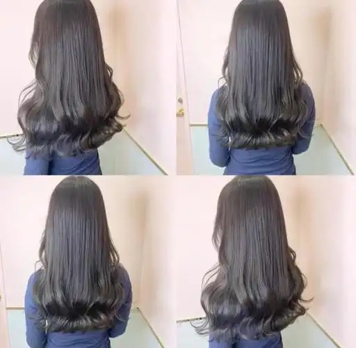 蓝黑色的头发加上发尾烫,冷色系的发色酷感十足,这样的长发发尾烫发型