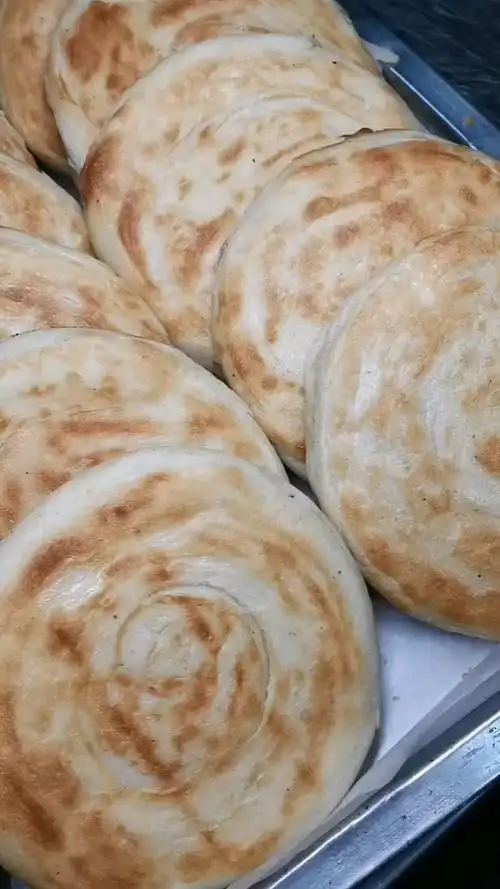 正宗的烤炉泰山烧饼,看得我直流口水!