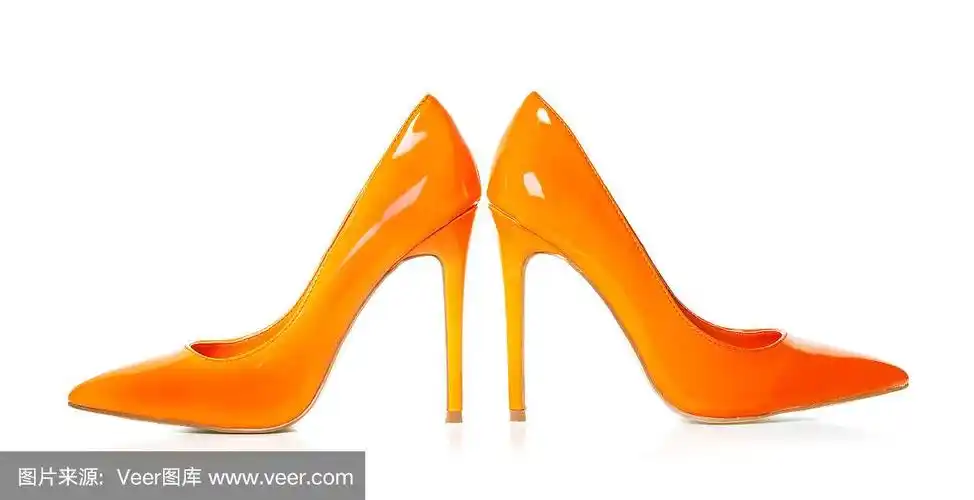 优雅的高跟鞋在橙色