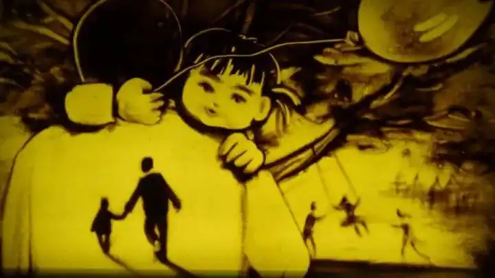 沙画《感恩的心》