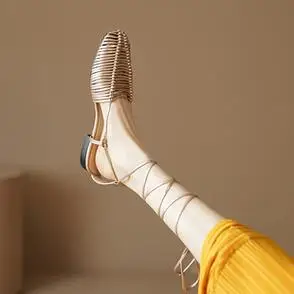 性感罗马风2024夏一字带包头编织镂空猪笼鞋性感绑带平底女凉鞋