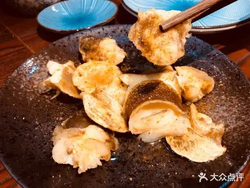 初八碳烤烤螺肉图片 - 第1张