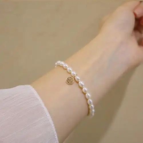 天然小珍珠手链女可吊坠福牌温柔气质简约14k注金手链