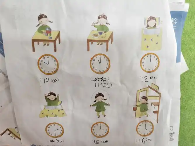 最后一个环节,请幼儿回家完成《操作单》上得罪作业,并且强调了整点