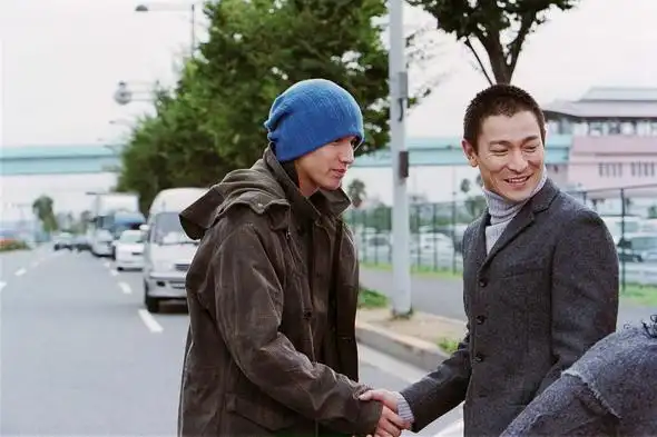 小可(言承旭饰)与传佑(刘德华饰)点击此处查看其它图片