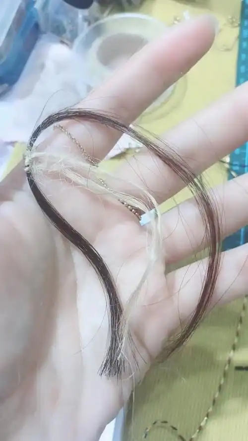 一个粉丝给我寄了一撮头发,帮她编了一根手绳.希望她520表白成功!