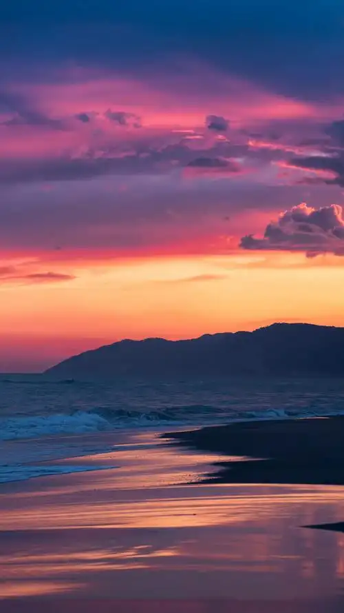 夕阳 晚霞 海滩手机壁纸