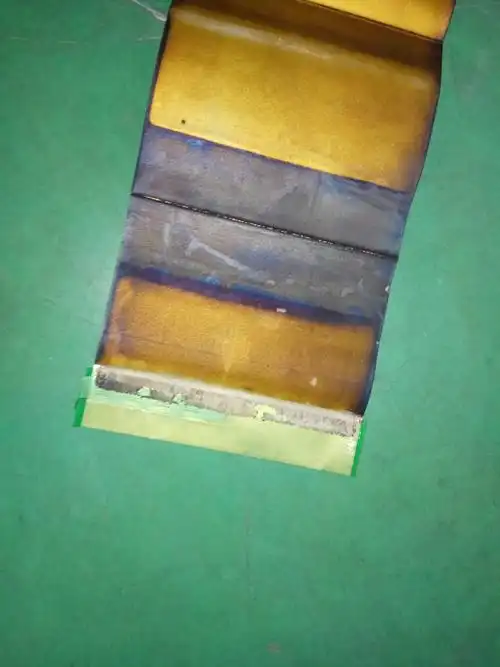 锂离子电池(软包)负极头部白色物质是什么?