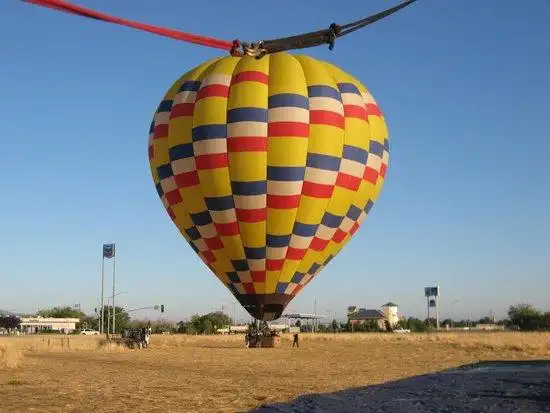 high above the valley floor - picture of balloons above the