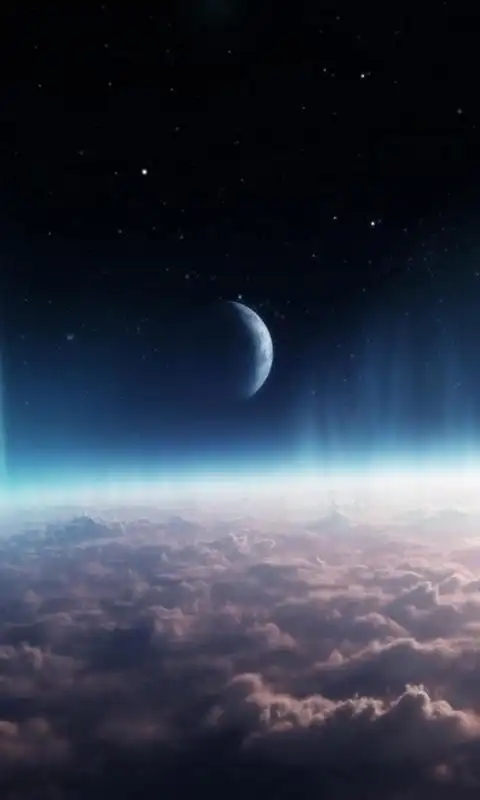 好看的在厚厚的大气云层的新月形月亮手机壁纸图片下载