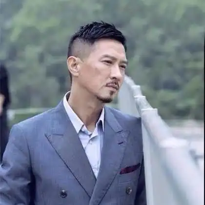 张家辉饰演的段坤是什么电影里的角色?