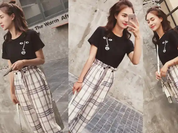 如果不知道要穿什么的话,就可以选择容易搭配又显瘦的格子裤,搭配黑色