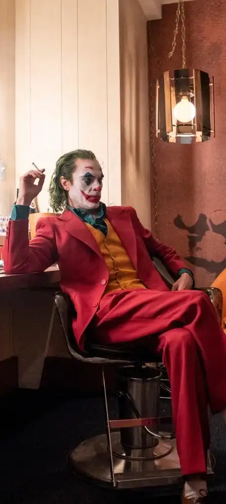 小丑 红色西装全面屏手机壁纸