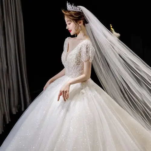 婚纱2021新款气质 夏季新娘重工奢华v领齐地简约大气拖尾主婚纱