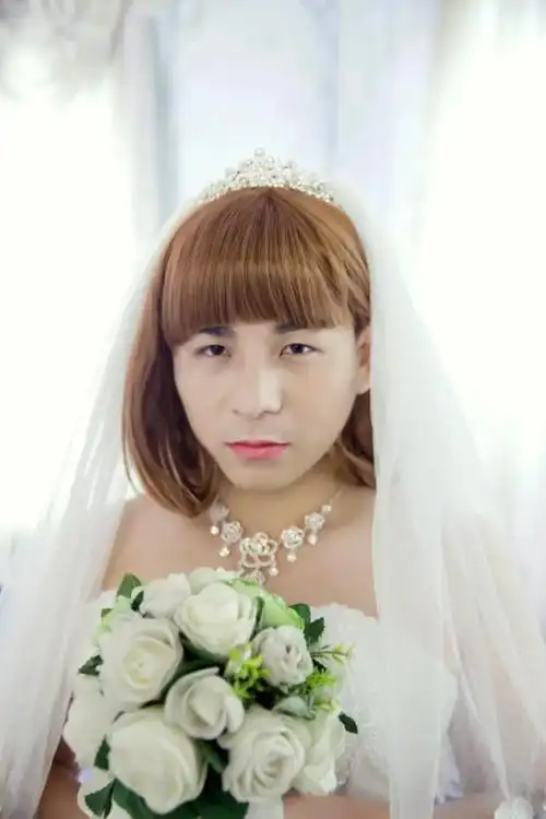 臭小子男扮女装也很秀气吧