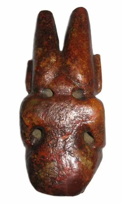 红山文化《红壳玉双角太阳神》 2