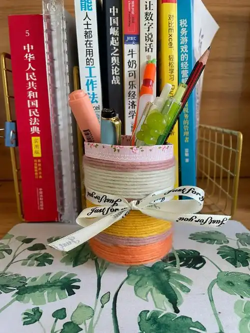 用废弃易拉罐自制一个笔筒