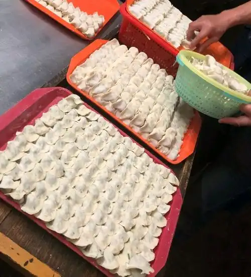 2021阿娥饺子摊美食餐厅,.怕巷子深她家墙上的照片墙.【去哪儿攻略】