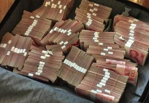 一万块人民币有多重?