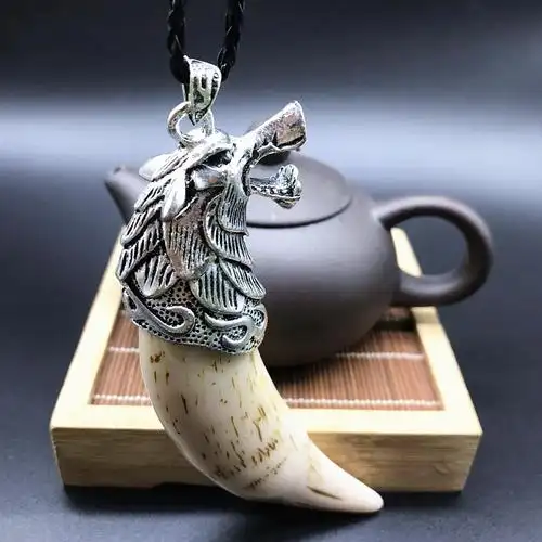 厂家直销精美仿古做旧骨雕牙雕挂件白铜老虎头镶牙齿吊坠挂饰