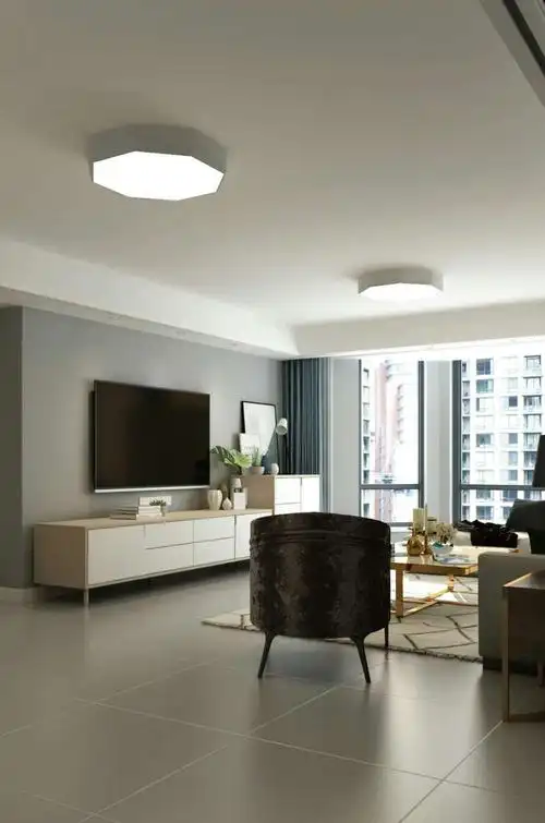 客厅简洁干净色彩搭配舒适沙发背景墙上生动的挂画添加了自然气息