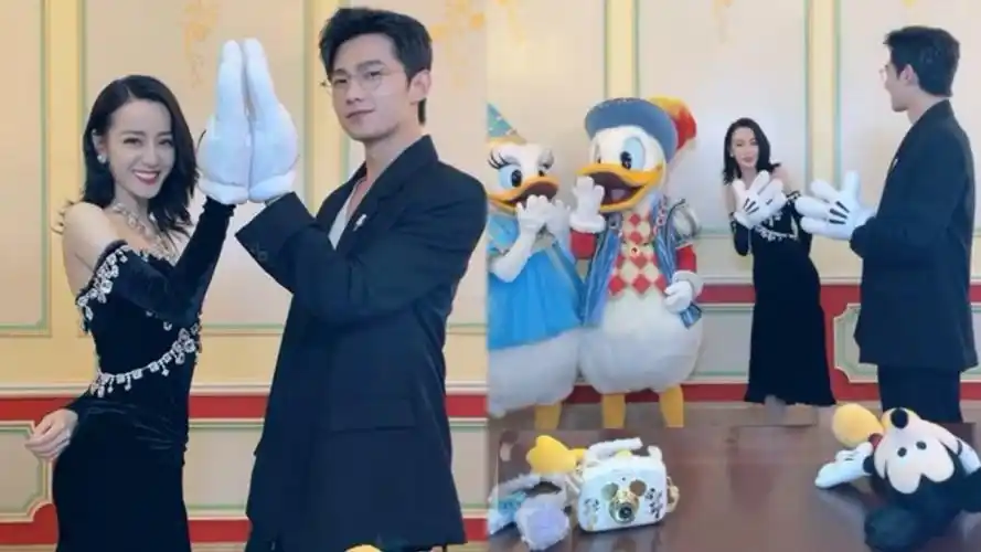 杨洋迪丽热巴现身迪士尼热巴身穿黑色礼服网友在逃公主回家