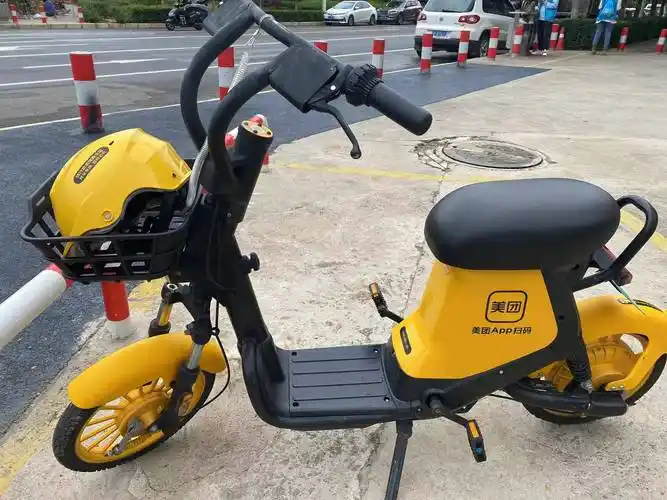 丽江街头 美团共享电单车来了!起步价20分钟3元_市民_车辆_电动车