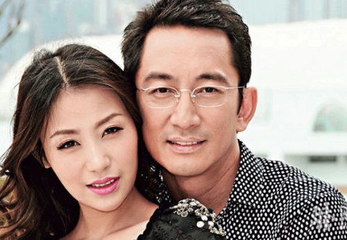 吴启华和石洋子  年龄相差:21岁